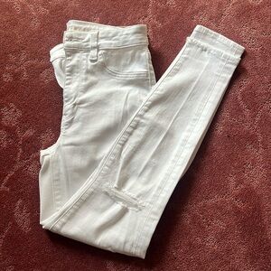 American Eagle super high rise jegging. Size 4 short, holes in knees